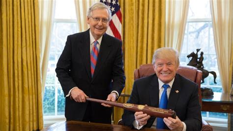 Mitch Mcconnell Gives Donald Trump Louisville Slugger To Mark Tax Bill