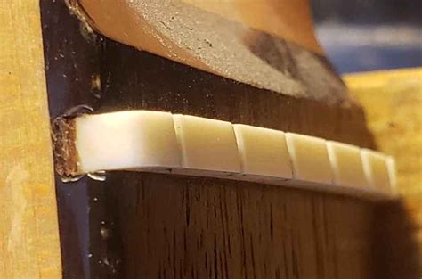 how to change a nut on a guitar