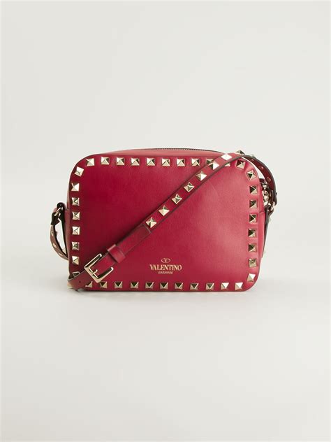 Lyst - Valentino Rockstud Cross Body Bag in Red