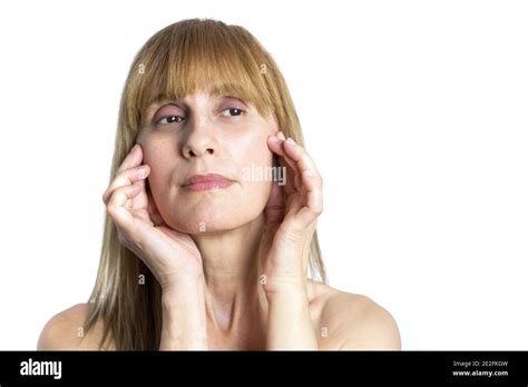 Caucasian Blonde Woman Massaging Her Face Stock Photo Alamy