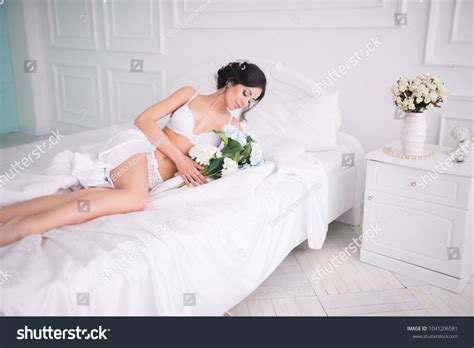 Sexy Woman Lingerie Lying Bed Flowers Stock Photo 1041206581 Shutterstock