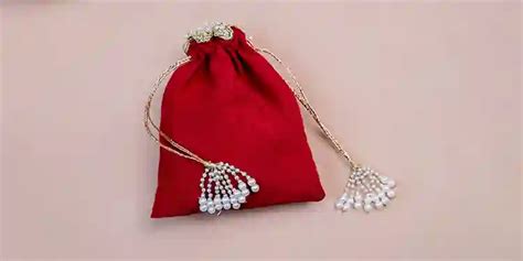 Rajtilak Rangoli Silver Rakhi With Suede Pouch Rakhi Special In