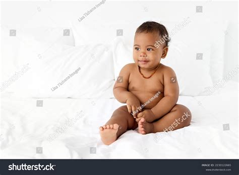 Naked Baby Sitting On Bed Wearing Stock Photo Shutterstock