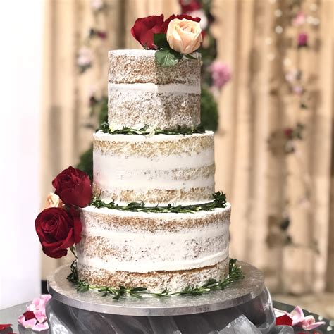 Semi Naked Wedding Cake With Flowers