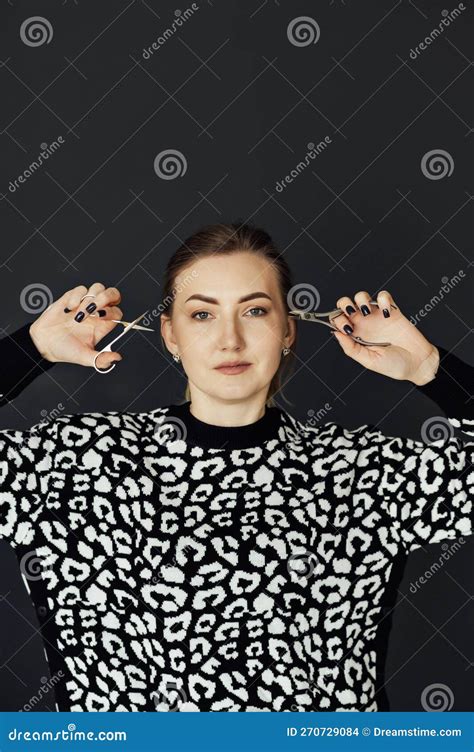 The Nail Master Holds Scissors And Other Tools In His Hands Beautiful Blonde Girl Stock Photo