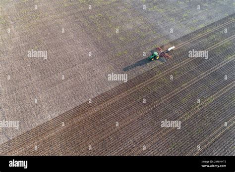63801 16205 Aerial View Of Tractor Applying Anhydrous Ammonia To Corn