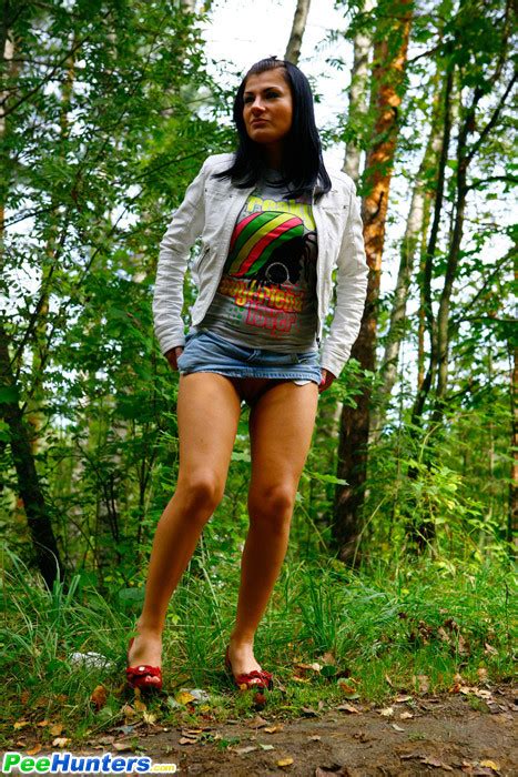 Bootylicious Brunette Takes A Leak In Public Park Porn Pictures XXX Photos Sex Images