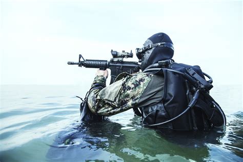 Navy Seal Frogman With Complete Diving Gear And Weapons In The Water