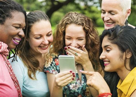 Friends Laughing At Something On A Phone Premium Image By Rawpixel