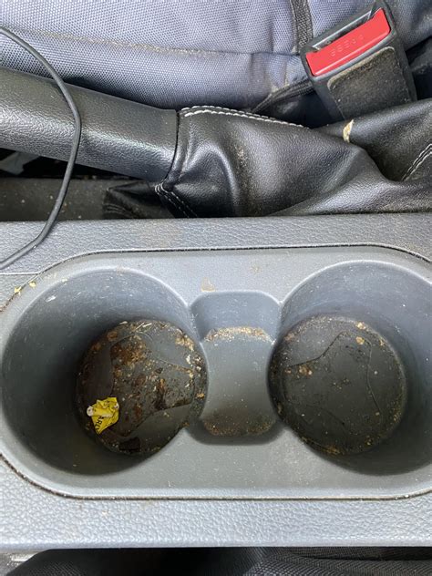 How to clean the cup holders in my car? Without filling them up with