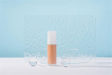 Premium Photo Cosmetic Liquid Foundation Nude Cream Bottle Mockup On Blue Backdrop Beige