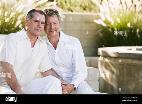 Gay Couple Hugging Stock Photo Alamy