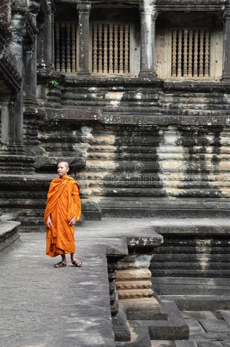 Monk Enters An Ancient Temple At Angkor Wat Editorial Stock Photo