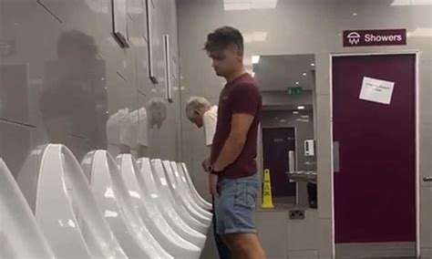 Spying On A Guy Peeing At Urinals And Then Shaking His Cock