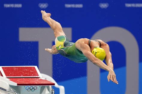 Australia pulls team from short-course swimming worlds | AP News