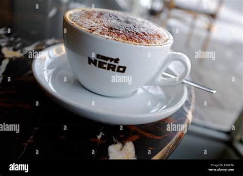 Caffe Nero Cappuccino Coffee In White Cup And Saucer Stock Photo Alamy