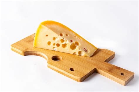 Premium Photo Wooden Board With Cheese