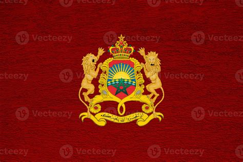 Flag And Coat Of Arms Of Kingdom Of Morocco On A Textured Background