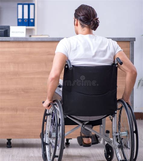 Young Man At Hospital Reception Desk Stock Photo Image Of Handicapped