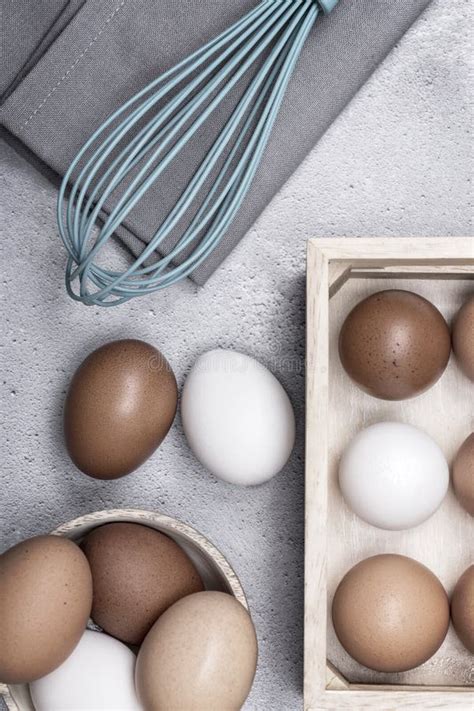 Free Range Eggs In A Egg Box With Whisk And Napkin Stock Photo Image