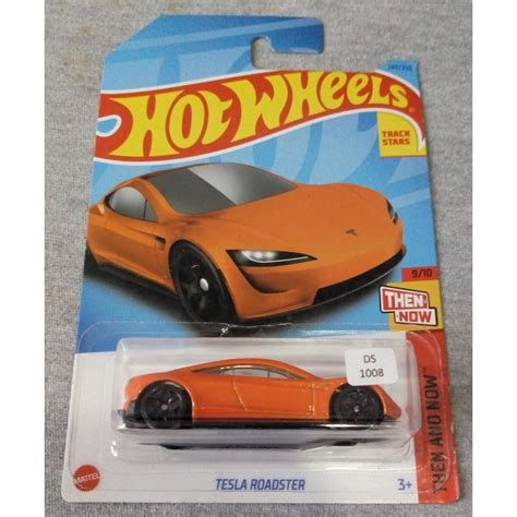 Jual Hot Wheels Tesla Roadster Then And Now Orange Shopee Indonesia
