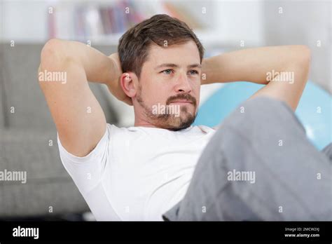 Fit Handsome Man Doing Sit Ups Stock Photo Alamy
