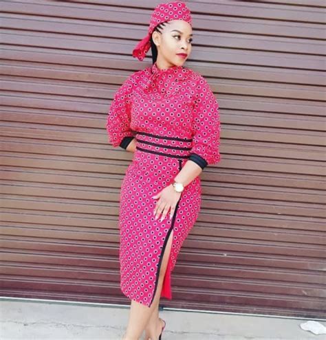 Clipkulture Lady In Pink Shweshwe Dress With Black Trimmings And Headwrap