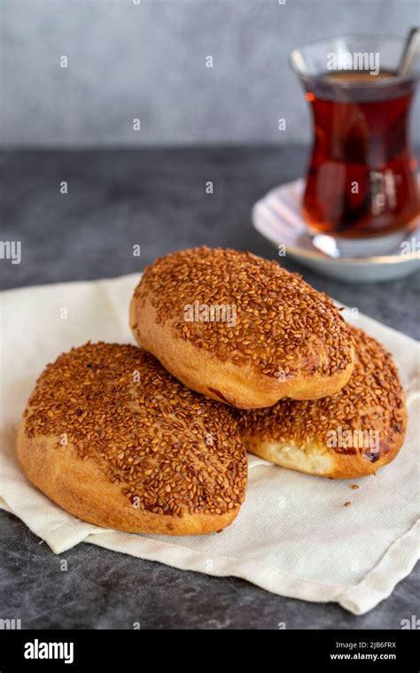 Cheese Pogaca. Turkish pastry product. Sesame pogaca on a dark ...