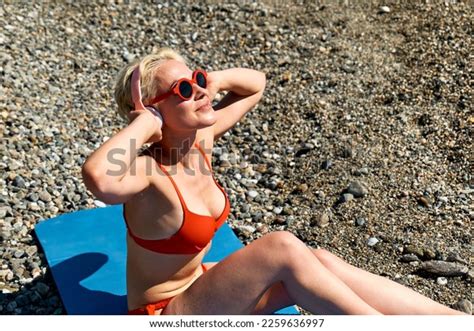Blond Sexy Woman Red Bikini Listening Stock Photo 2259636997 Shutterstock