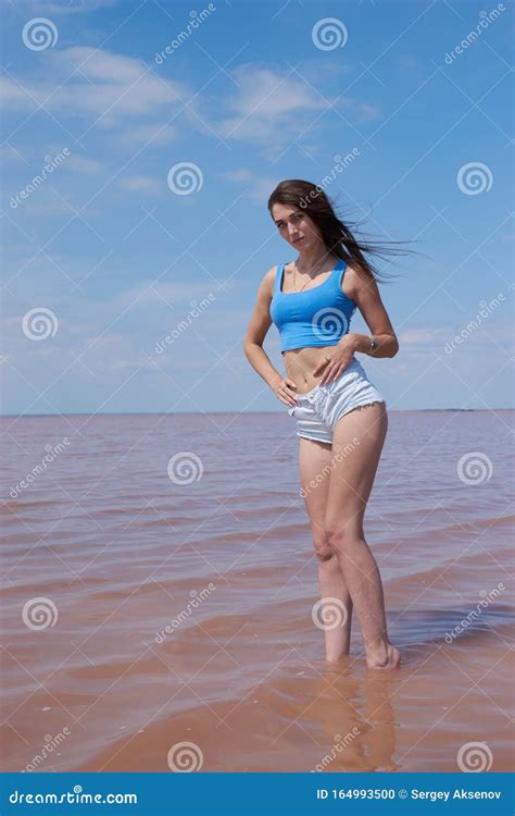Hot Brunette Posing Near The Lake Stock Photo Image Of Summer Green