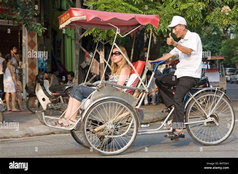 Bicycle taxi Hanoi Vietnam Stock Photo - Alamy