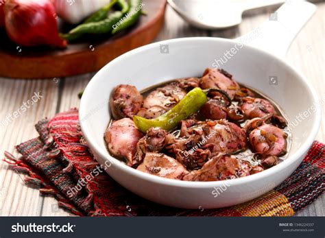 24 Adobong pusit Images, Stock Photos & Vectors | Shutterstock