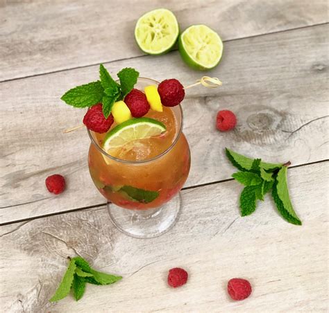 Passion Fruit Mango And Raspberry Mojito Mocktail