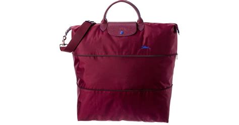 Longchamp Le Pliage Expandable Nylon Travel Bag In Purple Lyst Uk