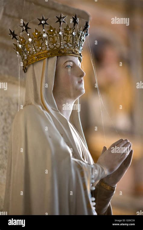 Statue Of Virgin Mary Wearing Crown Inside Parish Church Saint