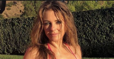 57 Year Old Elizabeth Hurley Dances And Shows Off Her Boobs In A Blue Bikini Page 3 Of 7