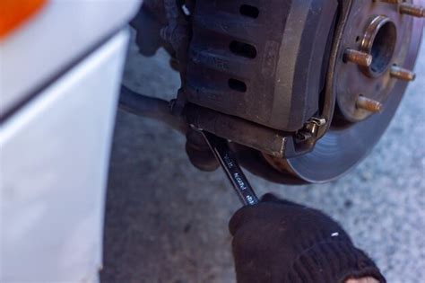 Premium Photo Car Mechanic Fixing Car