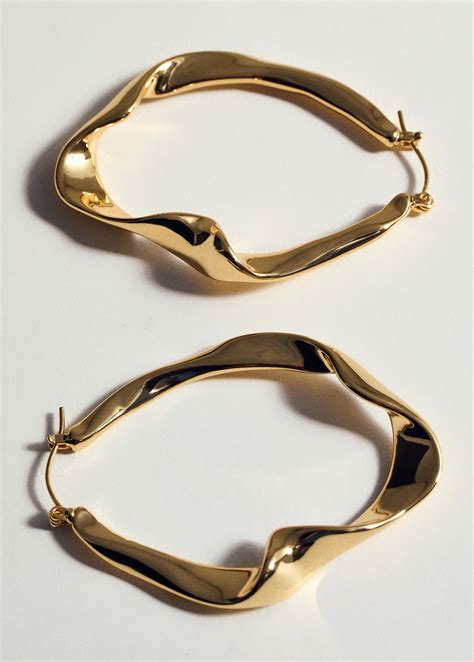 Twisted hoop earrings - Women | MANGO United Kingdom
