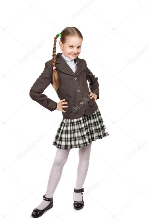 Beautiful little girl in school uniform with books — Stock Photo © akvafoto2012 #72844009