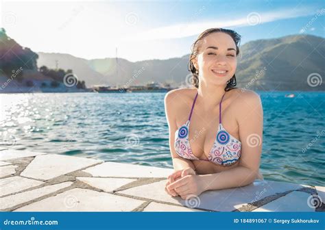 Pretty Brunette Posing In The Water Stock Image Image Of Icmeler Girl 184891067