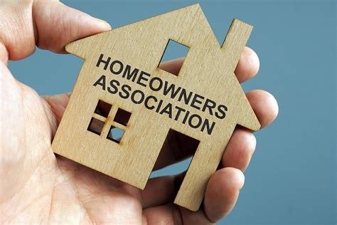 Homeowners Association Hoa Written On A Model Of Home