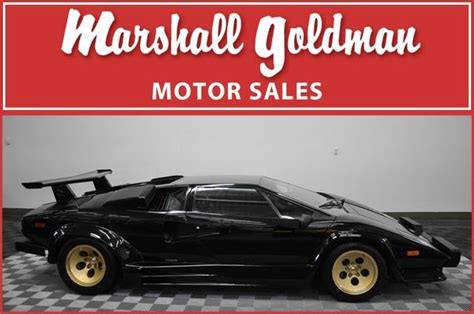 1986 LAMBORGHINI COUNTACH IS BLACK WITH BLACK LEATHER INTERIOR ONLY