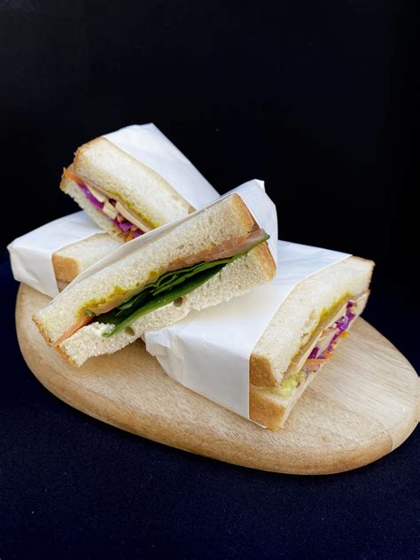 Chef's Selection of Assorted Sandwiches - Elegancy Catering
