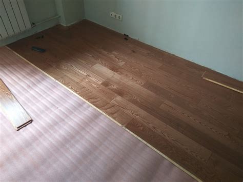 Подложка под доску пола ламината и как выбрать для неровного пола