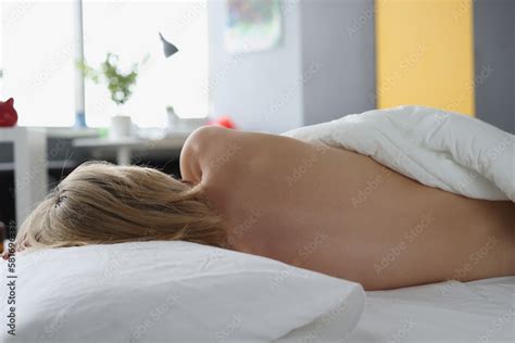 Sleeping Nude Woman On Bed Rear View Stock Photo Adobe Stock