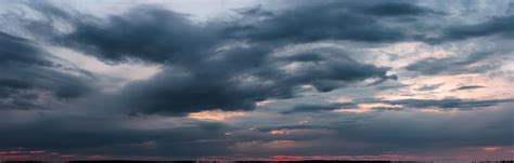 Premium Photo | Dramatic dark sunset. panorama of dark rain clouds in ...