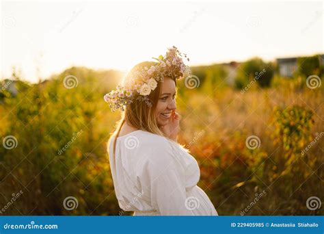 Portrait Of A Pregnant Woman A Beautiful Young Pregnant Woman In A