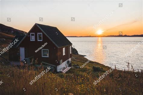 Wooden Red House With Iceberg In Nuuk Capital Of Greenland Typical