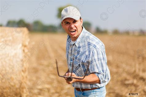 Angry Farmer In A Meadow Stock Photo 78673 Crushpixel