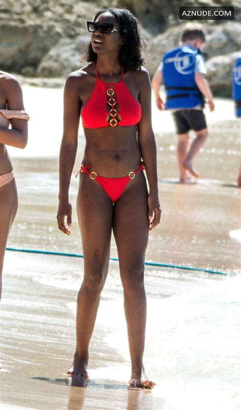 Mouna Traore Sexy In A Bright Red Bikini As She Enjoyed Some Fun In The Sun On Christmas Day In
